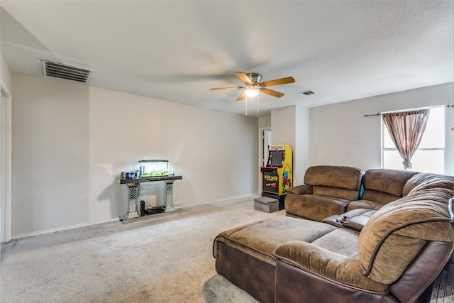 living room with carpet and ceiling fan