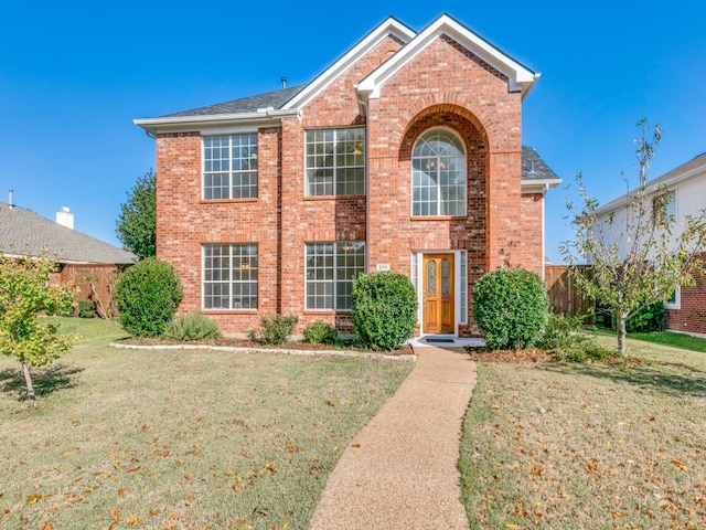 view of front of home with a front yard