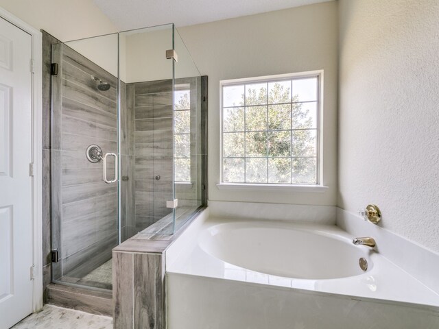 bathroom with plus walk in shower