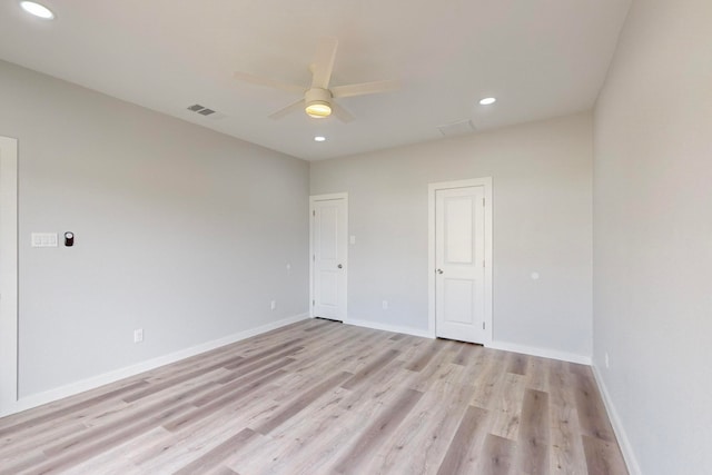 unfurnished room featuring light hardwood / wood-style flooring and ceiling fan