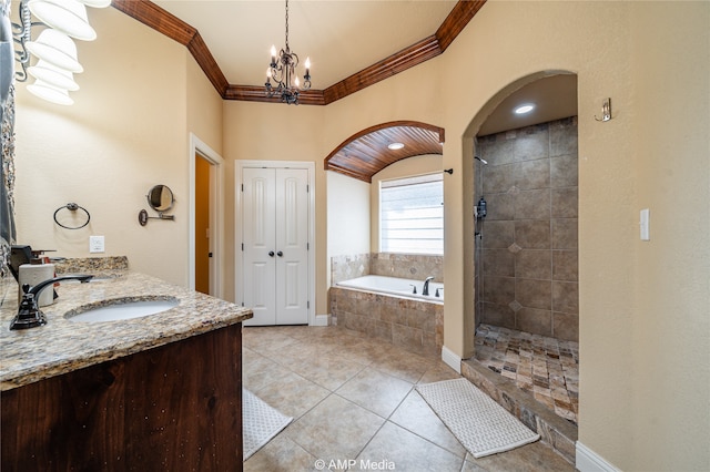 bathroom with shower with separate bathtub, a notable chandelier, vanity, crown molding, and tile patterned flooring