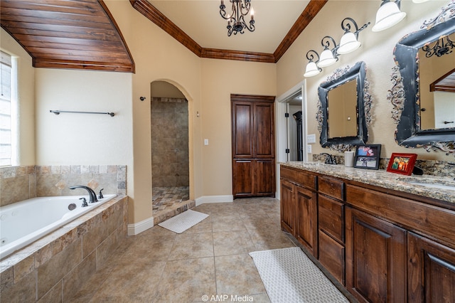 bathroom with separate shower and tub, a chandelier, ornamental molding, vanity, and tile patterned flooring