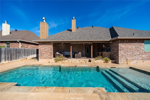 view of pool featuring a patio