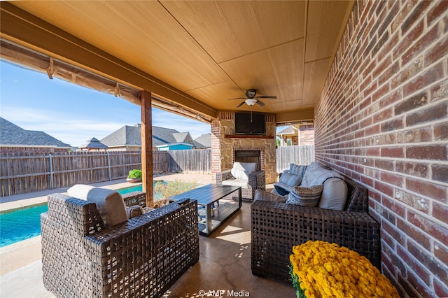 view of patio featuring a fenced in pool, an outdoor hangout area, and ceiling fan