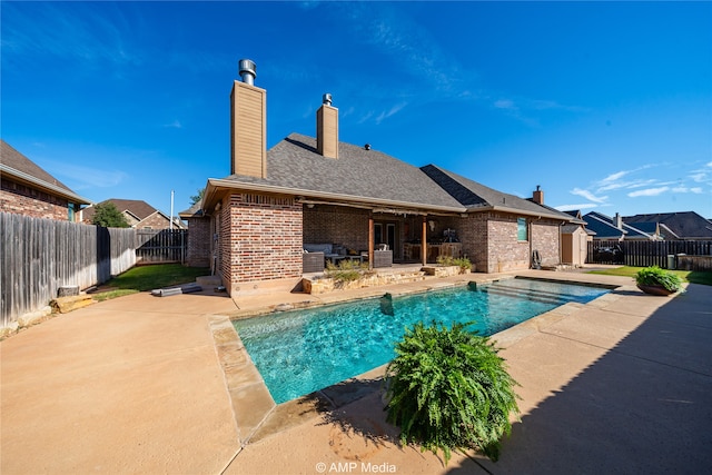 view of pool featuring a patio area