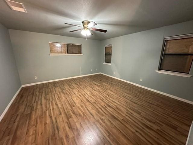 spare room featuring ceiling fan and wood-type flooring