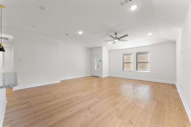 unfurnished room with light hardwood / wood-style floors and ceiling fan