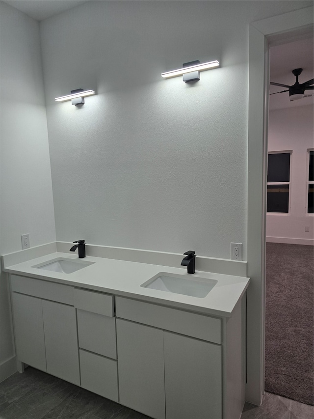 bathroom with vanity and ceiling fan