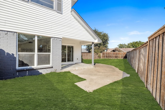 view of yard with a patio area