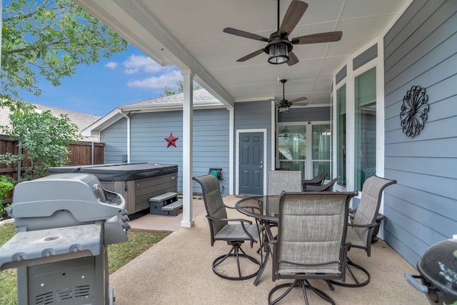 view of patio with a hot tub, grilling area, and ceiling fan