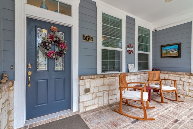 property entrance with a porch