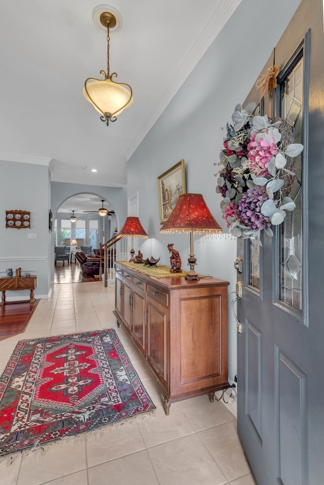 tiled entryway with crown molding