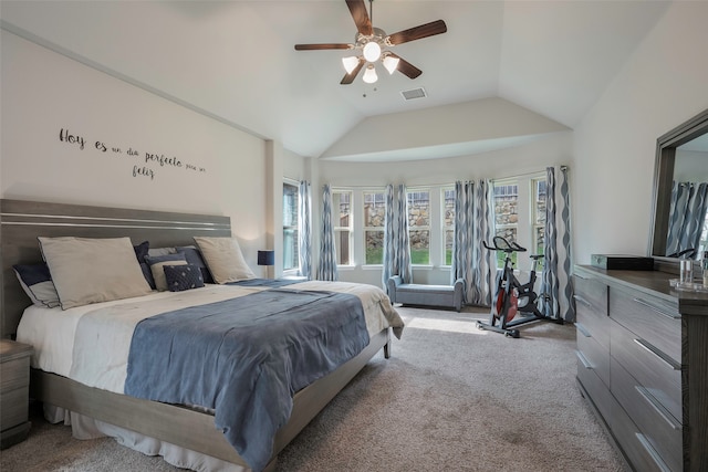 bedroom featuring light carpet, lofted ceiling, and ceiling fan