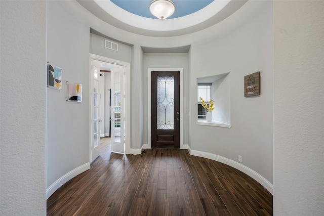 entrance foyer with dark hardwood / wood-style flooring