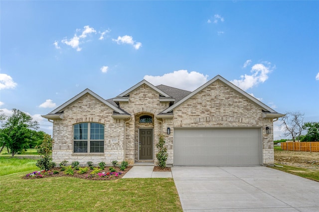 103 S Crestside Dr, Blue Ridge, TX 75424 - view of front of property featuring stone siding, driveway, a front yard, and a garage