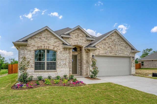 103 S Crestside Dr, Blue Ridge, TX 75424 - view of front of property featuring a front lawn, fence, stone siding, an attached garage, and driveway
