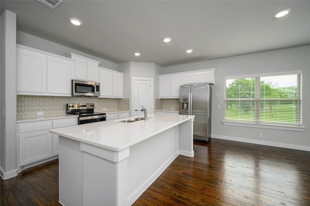 103 S Crestside Dr, Blue Ridge, TX 75424 - kitchen featuring backsplash, appliances with stainless steel finishes, an island with sink, and a sink