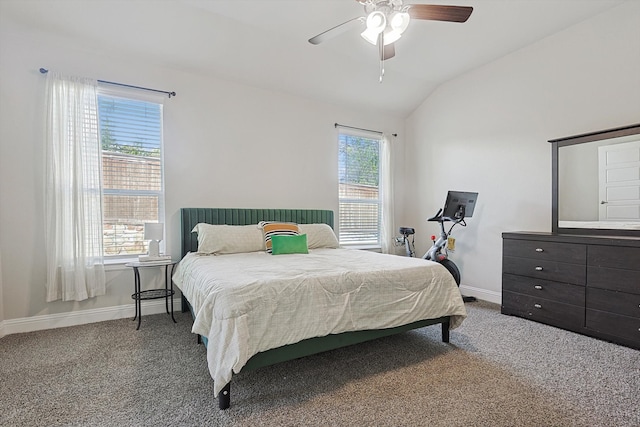 bedroom with ceiling fan, carpet floors, and lofted ceiling