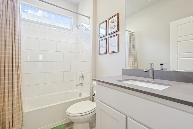 full bathroom with shower / bath combination with curtain, vanity, and toilet