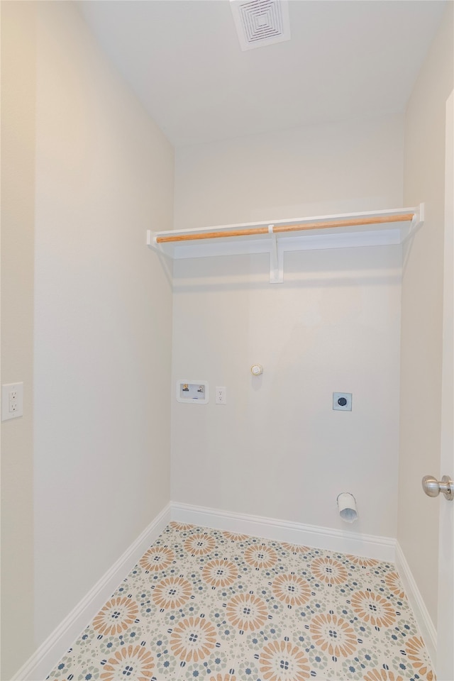 laundry room featuring washer hookup, electric dryer hookup, light tile patterned floors, and hookup for a gas dryer