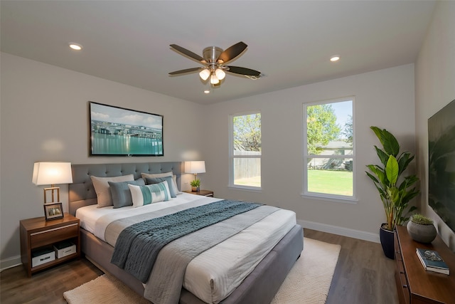 bedroom featuring dark wood-type flooring and ceiling fan