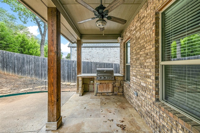 view of patio / terrace featuring area for grilling and ceiling fan