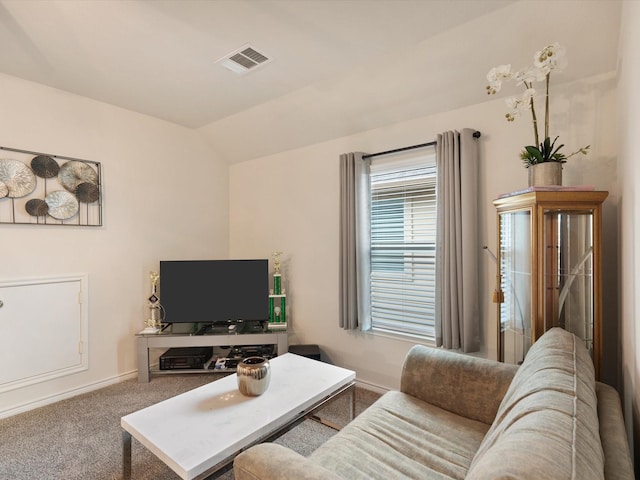 living room with carpet flooring and lofted ceiling