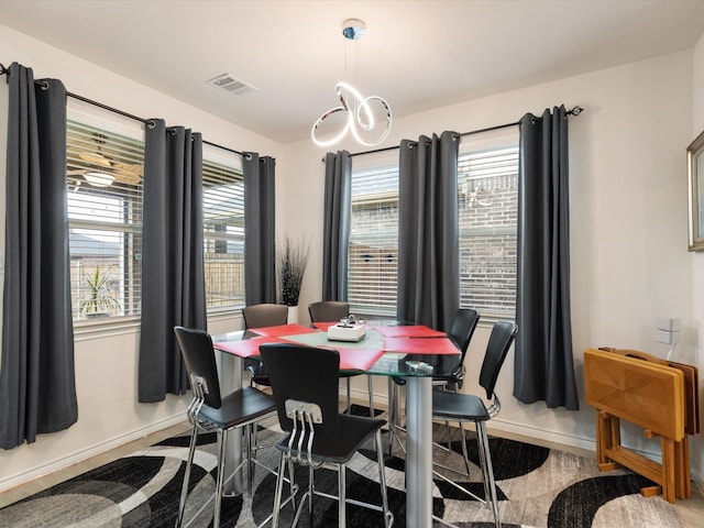 dining room with plenty of natural light