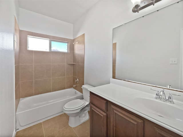 full bathroom featuring toilet, tiled shower / bath combo, vanity, and tile patterned flooring