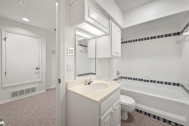 bathroom featuring toilet and vanity