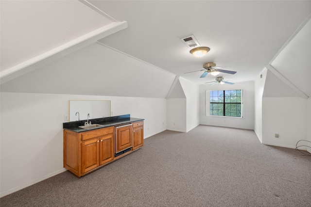 bonus room featuring light carpet, ceiling fan, sink, and lofted ceiling