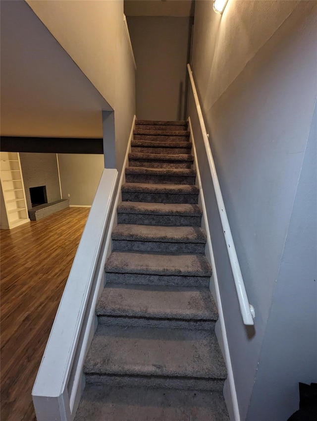 stairway with wood-type flooring