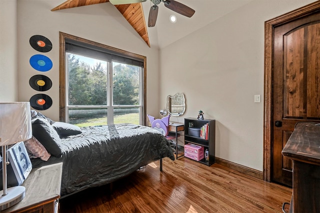 bedroom featuring vaulted ceiling, wood-type flooring, and ceiling fan