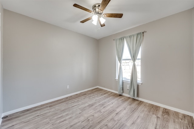 unfurnished room with light hardwood / wood-style flooring and ceiling fan