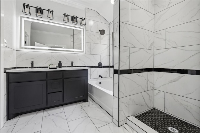 bathroom featuring vanity, ornamental molding, and shower with separate bathtub