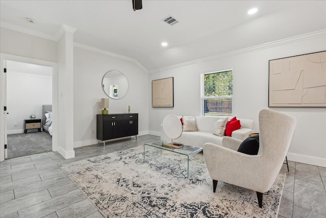 living room with crown molding and lofted ceiling