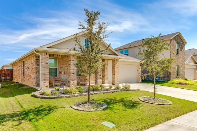 view of front facade featuring a front yard and a garage