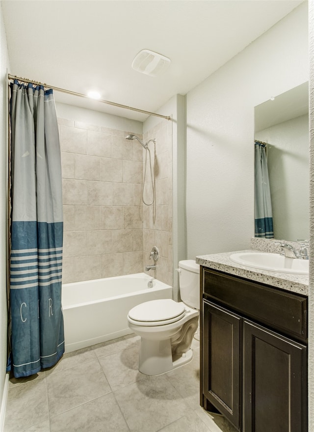 full bathroom with toilet, tile patterned flooring, vanity, and shower / tub combo