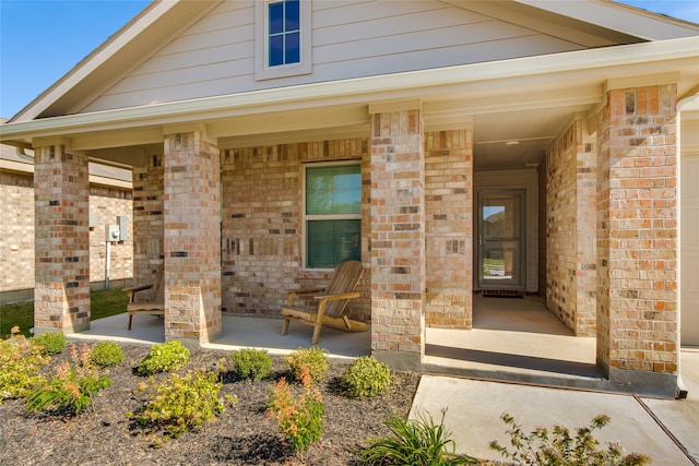 doorway to property with a porch