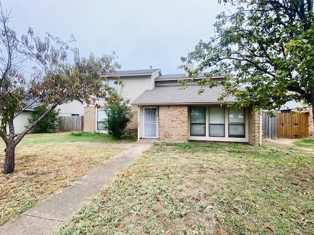 view of front of home with a front yard