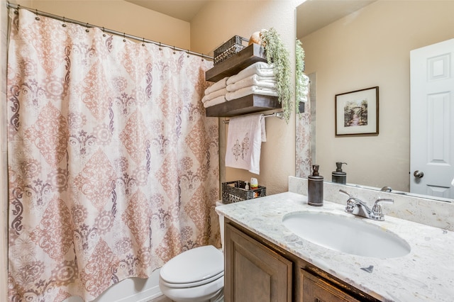 full bathroom featuring vanity, toilet, and shower / bath combo