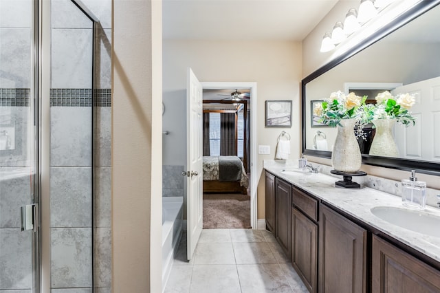 bathroom with vanity, separate shower and tub, ceiling fan, and tile patterned floors