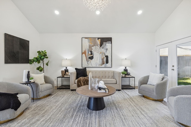 living room featuring french doors and vaulted ceiling