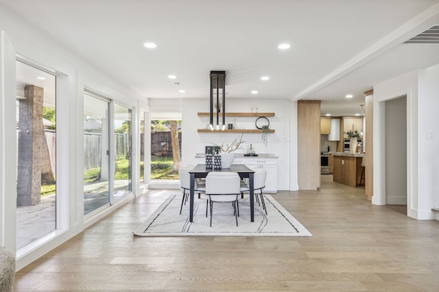 dining room featuring light hardwood / wood-style floors