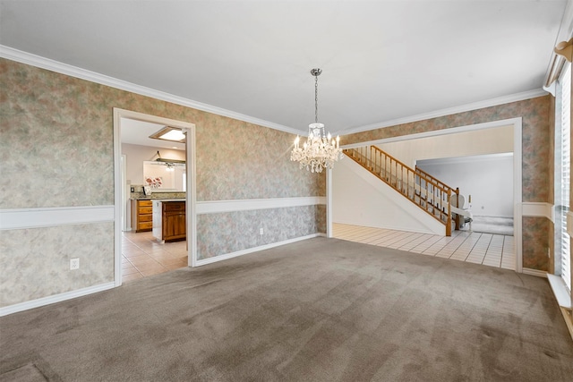 unfurnished dining area featuring light carpet, crown molding, and a notable chandelier