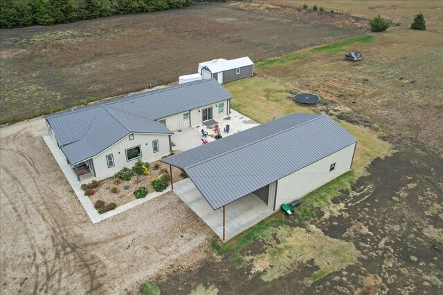 view of front of house with a garage and a carport