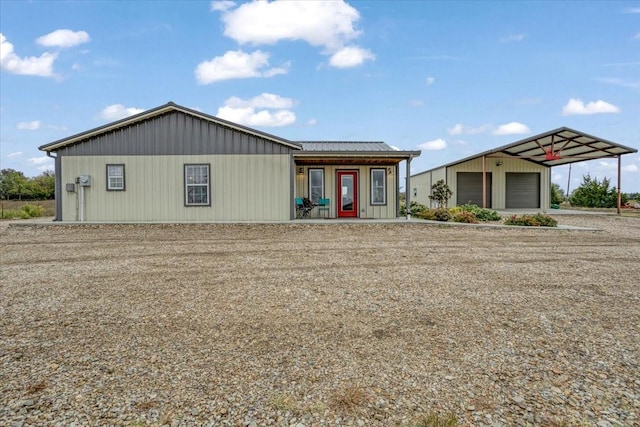 view of front of home featuring an outdoor structure and a garage