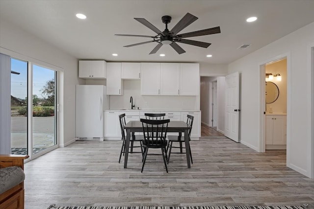 dining room with visible vents, recessed lighting, and light wood-style floors