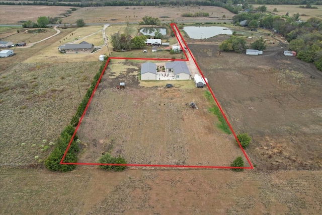 aerial view featuring a water view and a rural view