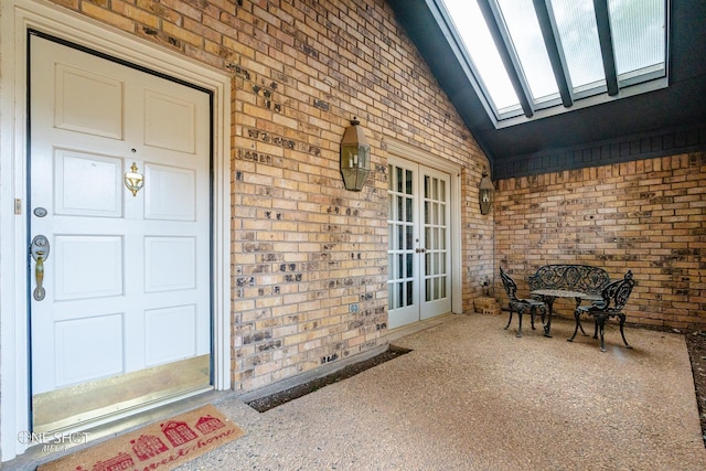 property entrance featuring french doors